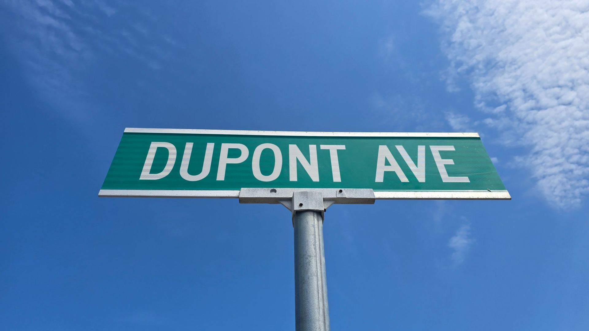 Dupont Ave street sign against a blue sky, Seaside Heights